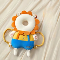 coussin pour proteger la tete du bebe lorsqu'il tombe il représente un lion