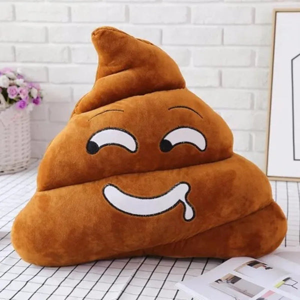 Coussin peluche émoji caca coquin avec les yeux plisser le regard en coin et un filé de bave dégoulinant de sa bouche 