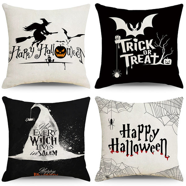 4 coussin noir et blanc avec des motifs de chauve-souris ainsi qu'une sourcière et un chapeau
