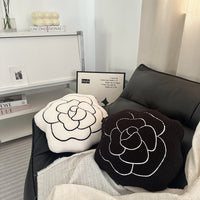 Coussin canapé camélia noir et blanc