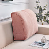 Coussin de canapé pour le dossier d'un canapé beige. Le coussin est de couleur rose avec une poche sur le coté