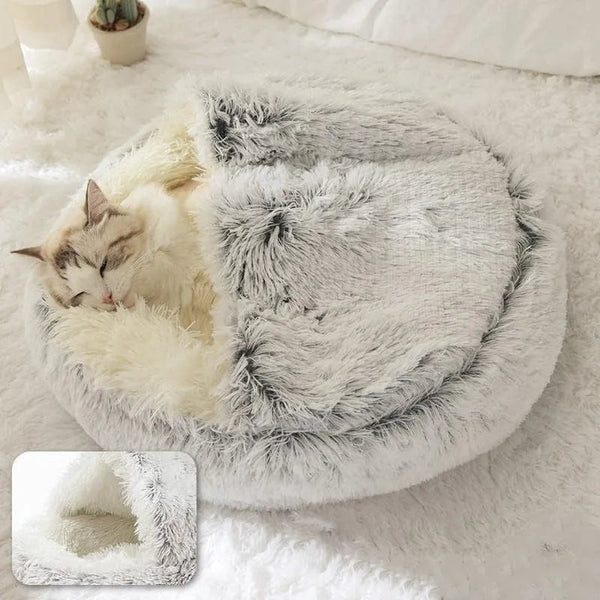 coussin pour chat nid douillet en forme de igloo gris avec un chat dedans 